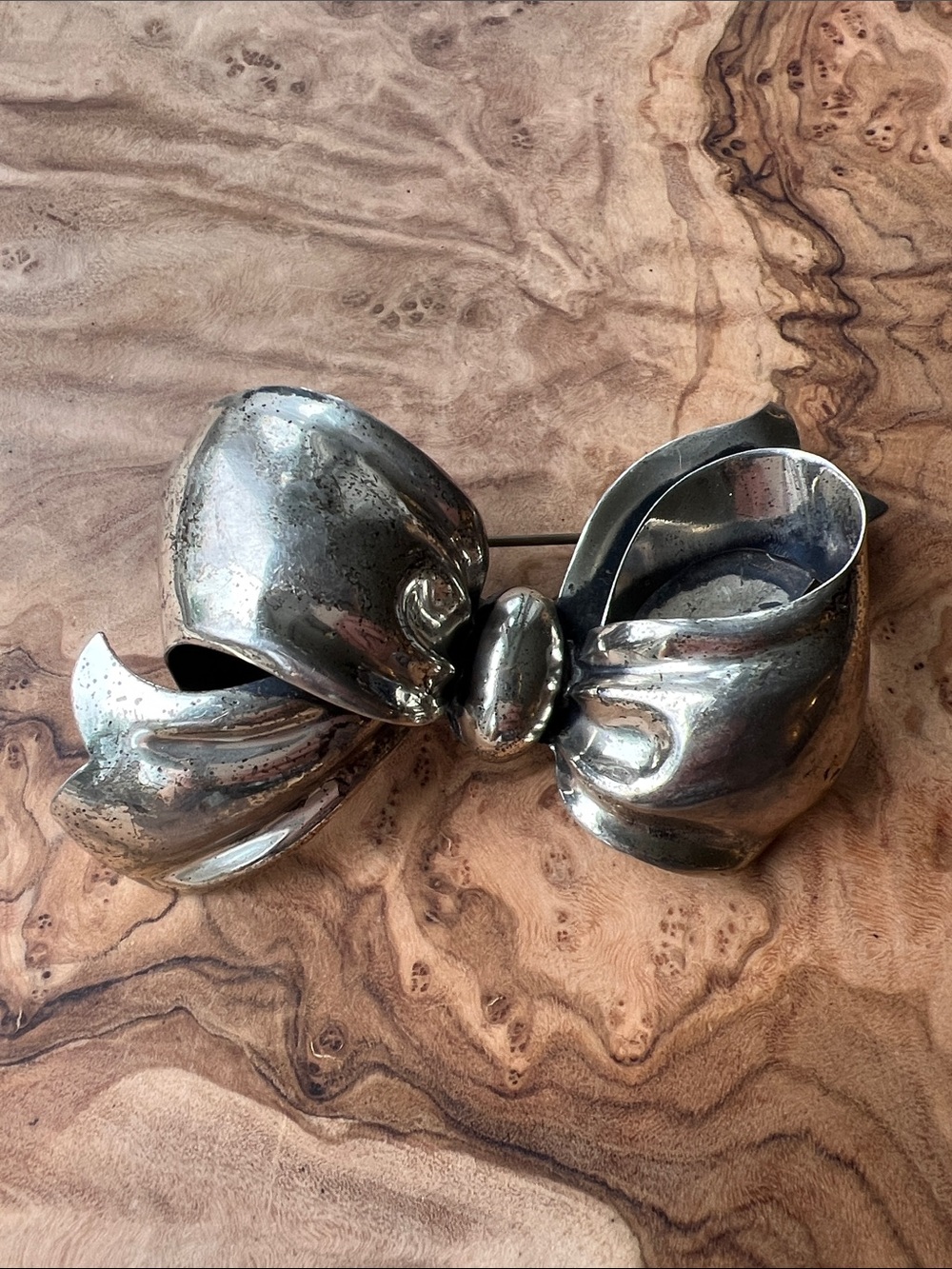 Vintage Monet Polished Silver Bow Brooch